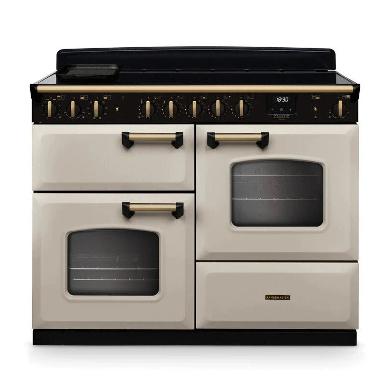 Rangemaster Classic Deluxe 110cm Induction Range Cooker - Pale Cream/Brass | CLDLO110EIPPCR/AB1